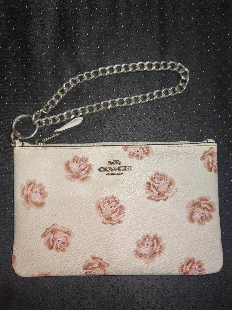 Coach Floral Corner Zip Wristlet (Category: Luxury Bags & Wallets) located in Tuguegarao City. Submitted by ekko_bag (Listing ID 1470607076, Image 1). Description: Item Specifics: Condition - In excellent condition - REPLACED wristlet strap ✔️✔✔ -Card pocket x2 -Rose floral print ✔️✔✔ Mode of payment - Gcash Payment first, No COD Location - Tuguegarao City ⚠️⚠️⚠️ Please manage your expectations. IMPORTANT: This item is being sold as-is. Authentic