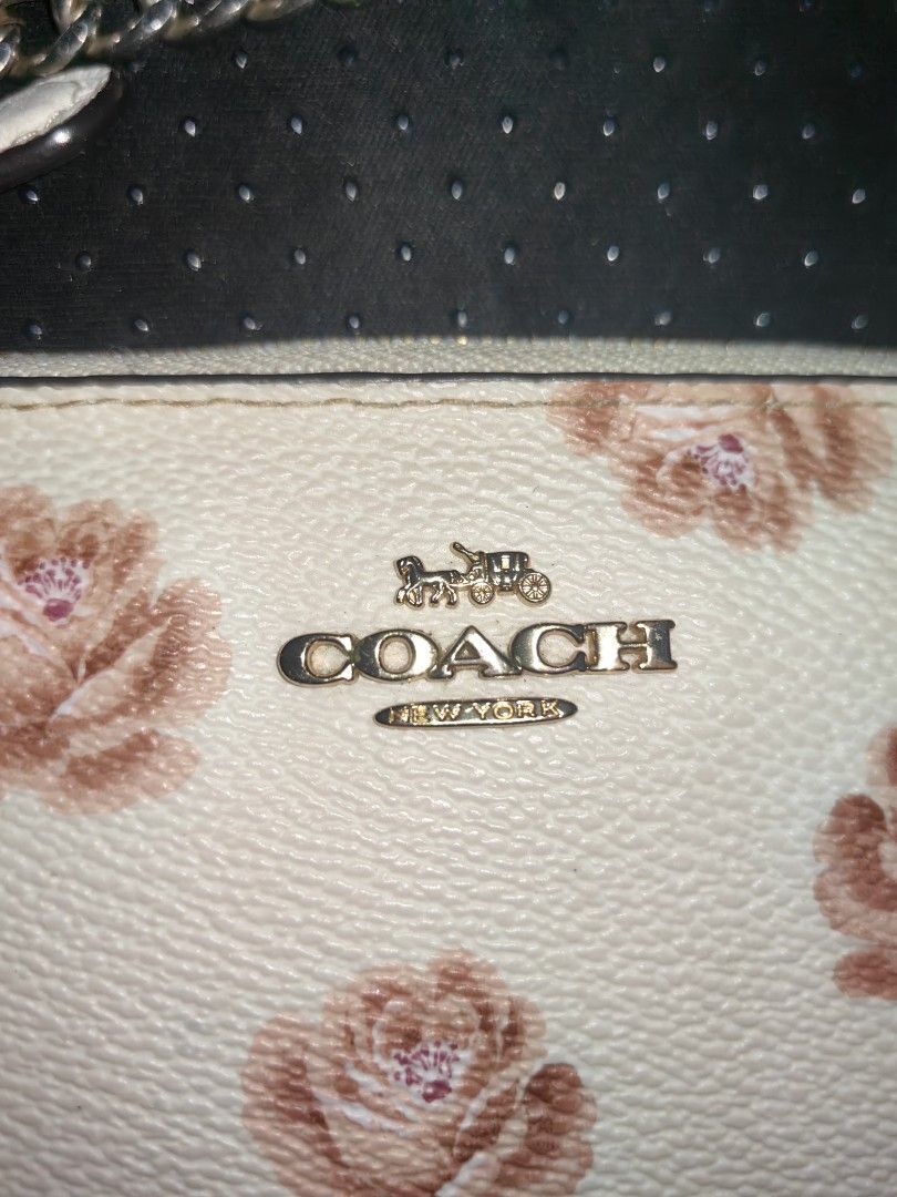 Coach Floral Corner Zip Wristlet (Category: Luxury Bags & Wallets) located in Tuguegarao City. Submitted by ekko_bag (Listing ID 1470607076, Image 2). Description: Item Specifics: Condition - In excellent condition - REPLACED wristlet strap ✔️✔✔ -Card pocket x2 -Rose floral print ✔️✔✔ Mode of payment - Gcash Payment first, No COD Location - Tuguegarao City ⚠️⚠️⚠️ Please manage your expectations. IMPORTANT: This item is being sold as-is. Authentic
