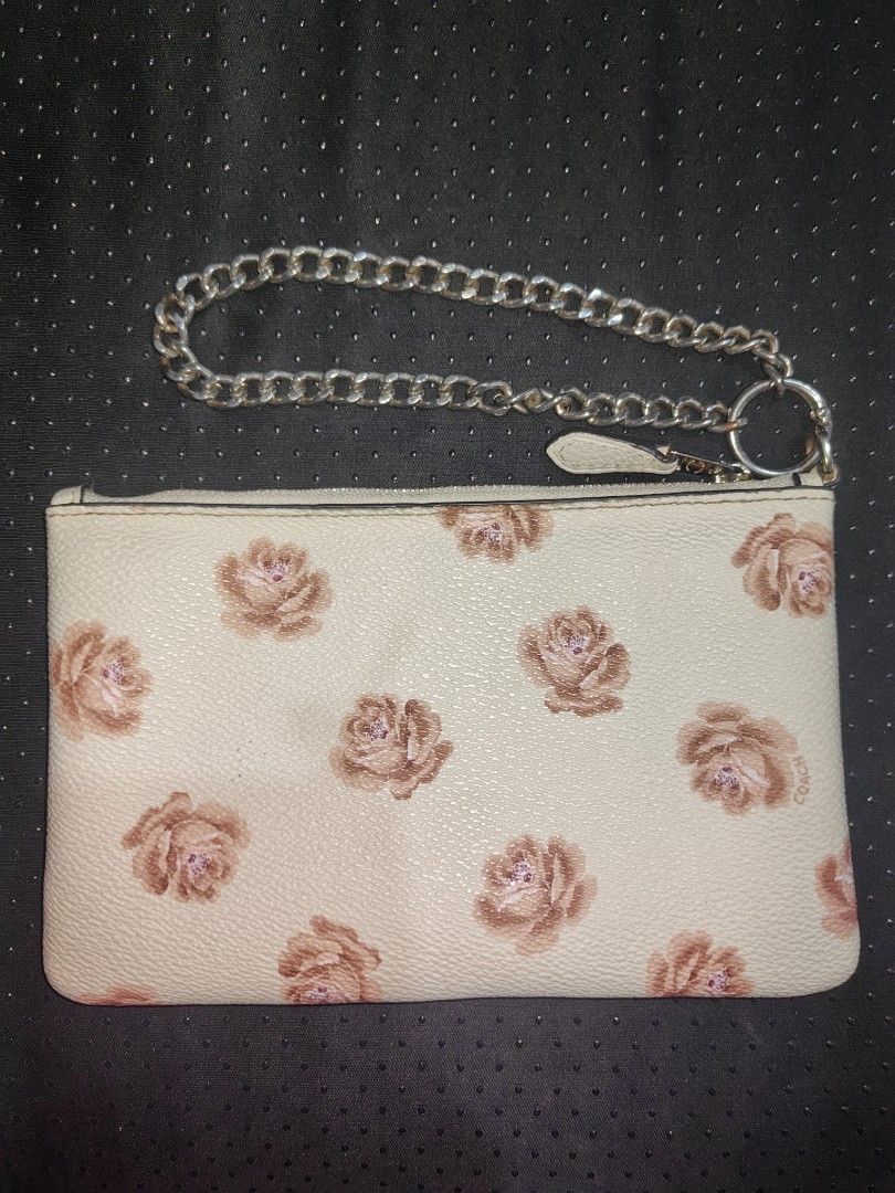 Coach Floral Corner Zip Wristlet (Category: Luxury Bags & Wallets) located in Tuguegarao City. Submitted by ekko_bag (Listing ID 1470607076, Image 3). Description: Item Specifics: Condition - In excellent condition - REPLACED wristlet strap ✔️✔✔ -Card pocket x2 -Rose floral print ✔️✔✔ Mode of payment - Gcash Payment first, No COD Location - Tuguegarao City ⚠️⚠️⚠️ Please manage your expectations. IMPORTANT: This item is being sold as-is. Authentic
