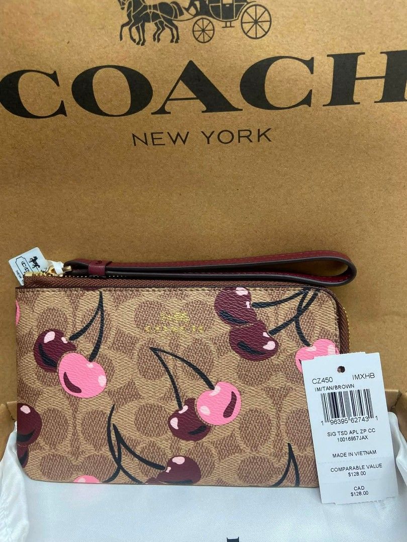 Coach wristlet wallet (Category: Wallets & Card holders) located in Manila. Submitted by k2collection.mnl (Listing ID 1470726909, Image 1). Description: 💜 SIGNATURE WRISTLET — COMPLETE INCLUSIONS 💜 ✨ Stylish and classy, perfect for everyday use or gifting! 🎁 COMPLETE INCLUSIONS: ✔️ Wristlet wallet ✔️ Wrist strap ✔️ Hang tag ✔️ Dust bag ✔️ Box packaging.