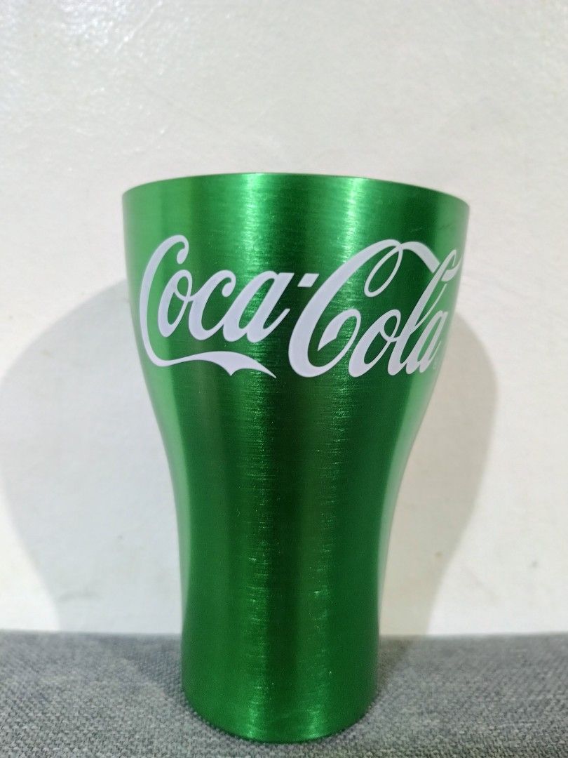 Coca-Cola X McDonald Aluminum Cup (Category: Other Kitchenware & Tableware) located in Cavite. Submitted by bodega_ni_kiks11 (Listing ID 1470648210, Image 1). Description: 🟢 Coca-Cola x McDonald's Aluminum Cup — Green ₱250 ✨ Limited edition collectible 🟢 Brushed metal finish, lightweight 🧼 Handwash only — good condition Great for display or daily use! Message me! 📩.