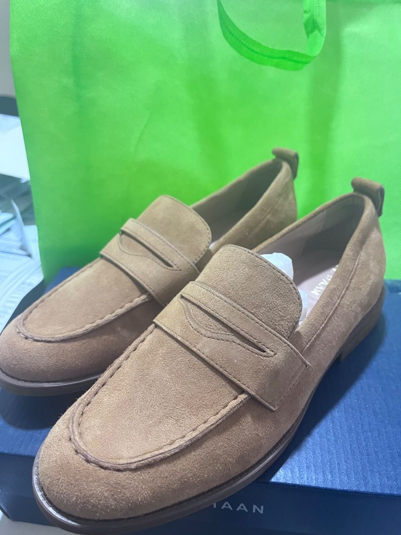 Cole Haan Suede Penny Loafers (Category: Loafers) located in Taguig. Submitted by jovina1994 (Listing ID 1470558376, Image 1). Description: - Brand: Cole Haan - Style: Classic slip-on penny loafer with traditional strap detail - Color: Camel brown - Material: Clean, textured suede - Features: Round toe silhouette, flat sole with a small heel - Inclusions: Original blue Cole Haan box - Condition: brand new.