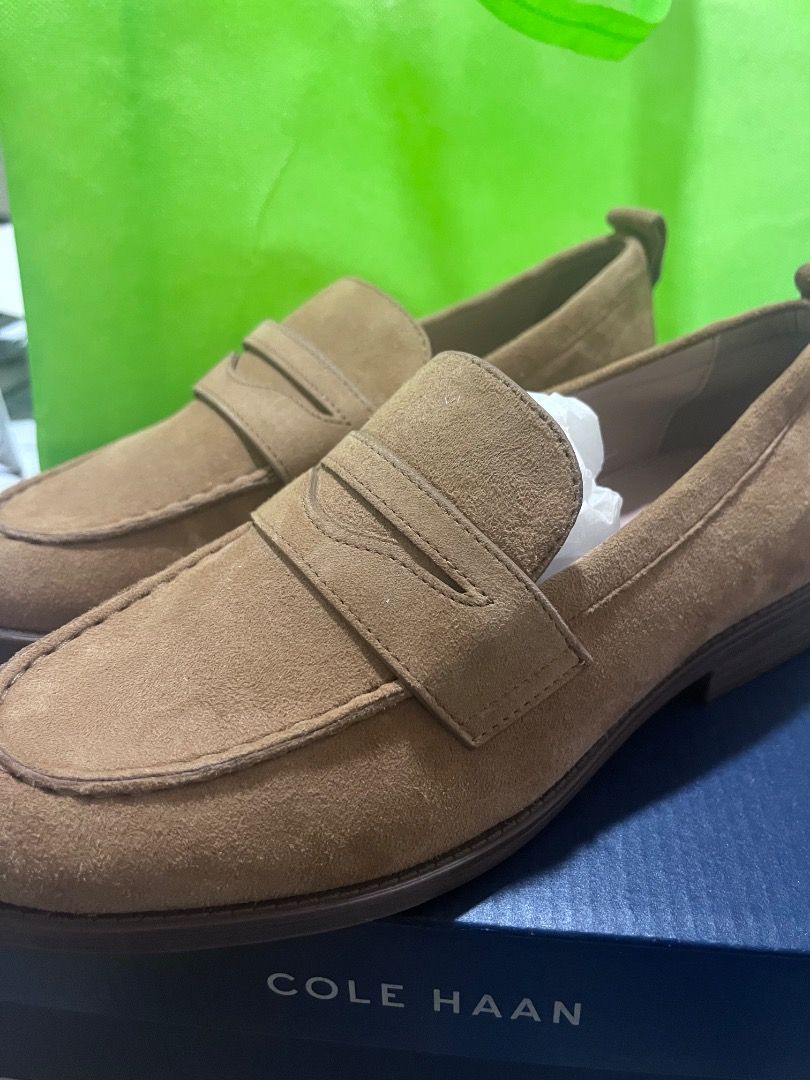 Cole Haan Suede Penny Loafers (Category: Loafers) located in Taguig. Submitted by jovina1994 (Listing ID 1470558376, Image 3). Description: - Brand: Cole Haan - Style: Classic slip-on penny loafer with traditional strap detail - Color: Camel brown - Material: Clean, textured suede - Features: Round toe silhouette, flat sole with a small heel - Inclusions: Original blue Cole Haan box - Condition: brand new.