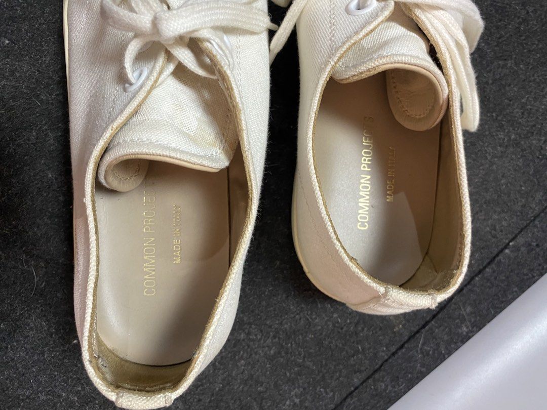 Common Projects Canvas Shoes (Category: Sneakers) located in Quezon City. Submitted by loloyz123 (Listing ID 1470684378, Image 3). Description: Common Projects Canvas Shoes Condition: Very good/ Heel drag Color rate: 9.5/10 Color: Canvas White Size: 42 insole: 29cm .