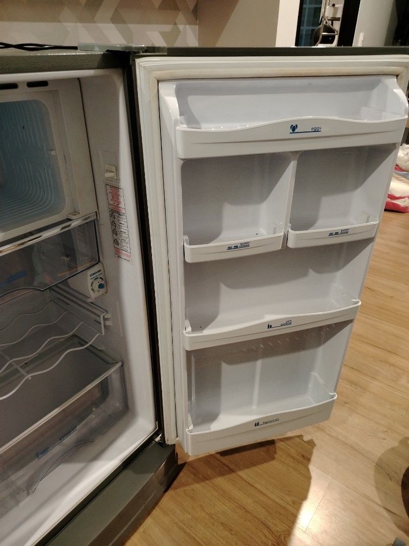 Condura Single Door Refrigerator (Category: Refrigerators and Freezers) located in Manila. Submitted by ostephensevilla (Listing ID 1470634375, Image 3). Description: - Brand: Condura - Type: Single door refrigerator in grey metal finish - Interior: Spacious with built-in freezer compartment, crisper drawers, wire shelving, and door storage racks - Features: Clean and ready for use, solid handle for easy opening - Design: Compact size that easily