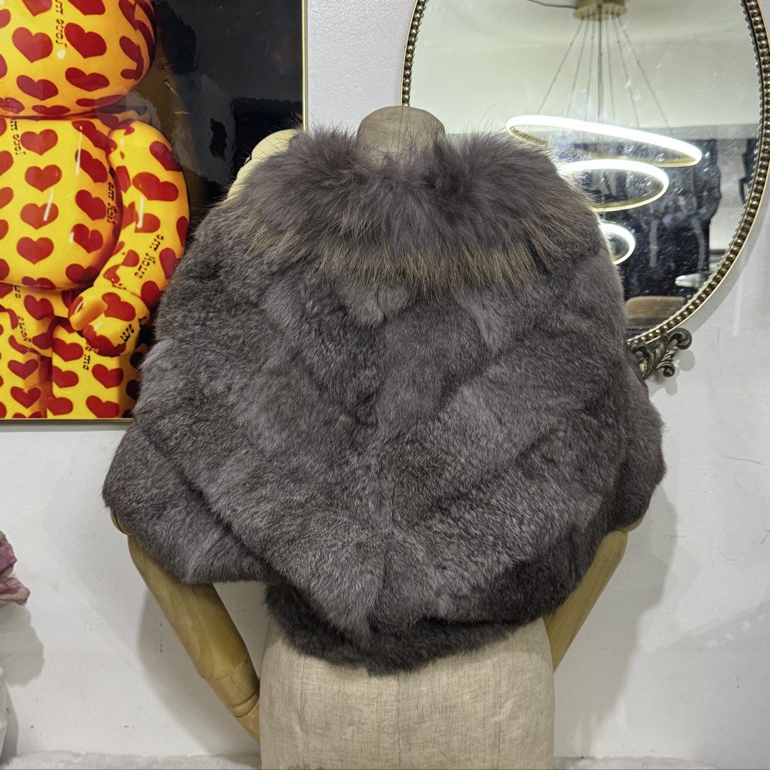 Connie & Na Grey real Fur blazer Size M (Category: Coats, Jackets and Outerwear) located in Rizal. Submitted by houseofbell (Listing ID 1470737604, Image 3). Description: Grey fur cape shrug from Connie & Na. Fluffy collar with layered panels throughout. Wild leopard print inner lining in gold and black tones. Size M tag attached. Hidden front fastening..