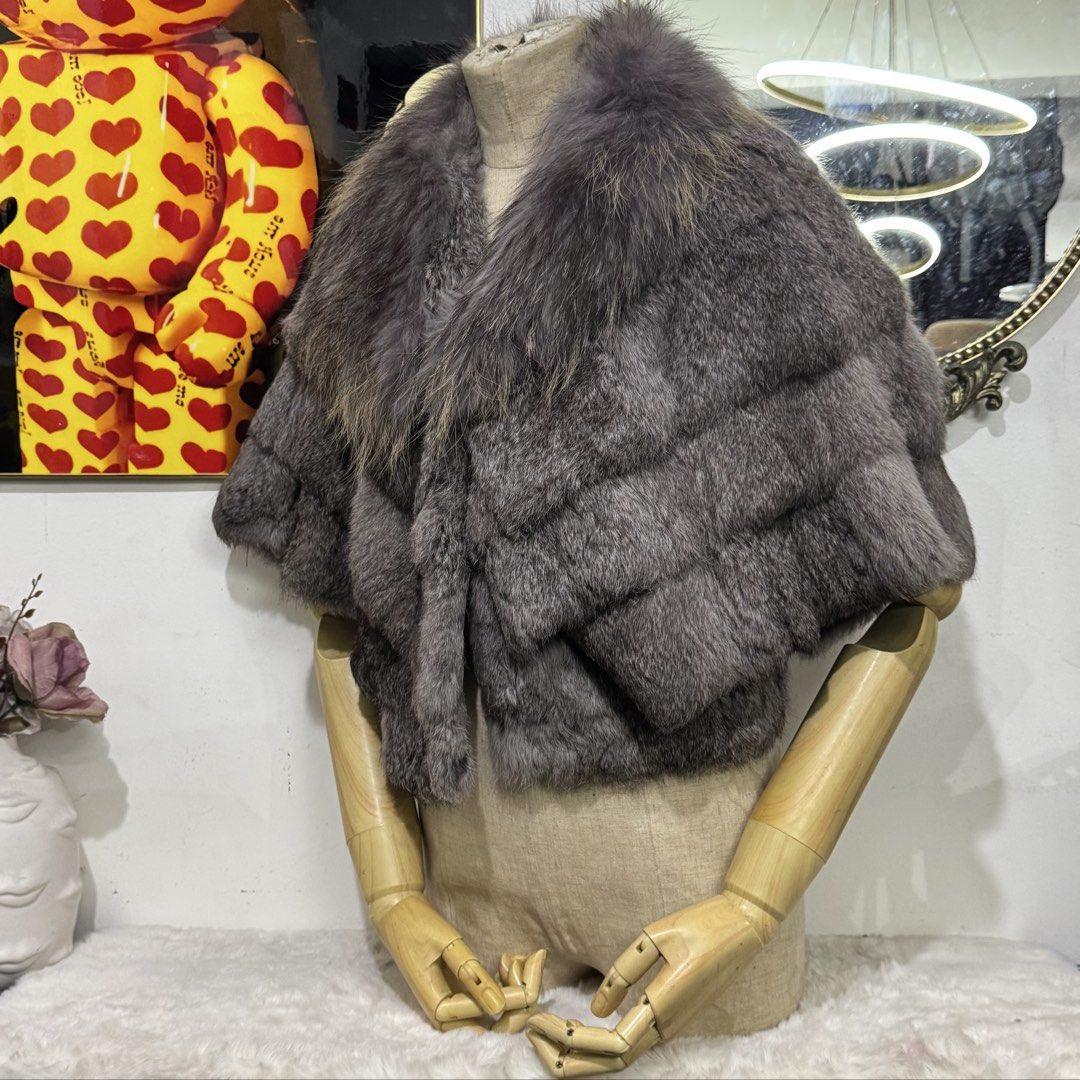 Connie & Na Grey real Fur blazer Size M (Category: Coats, Jackets and Outerwear) located in Rizal. Submitted by houseofbell (Listing ID 1470737604, Image 2). Description: Grey fur cape shrug from Connie & Na. Fluffy collar with layered panels throughout. Wild leopard print inner lining in gold and black tones. Size M tag attached. Hidden front fastening..
