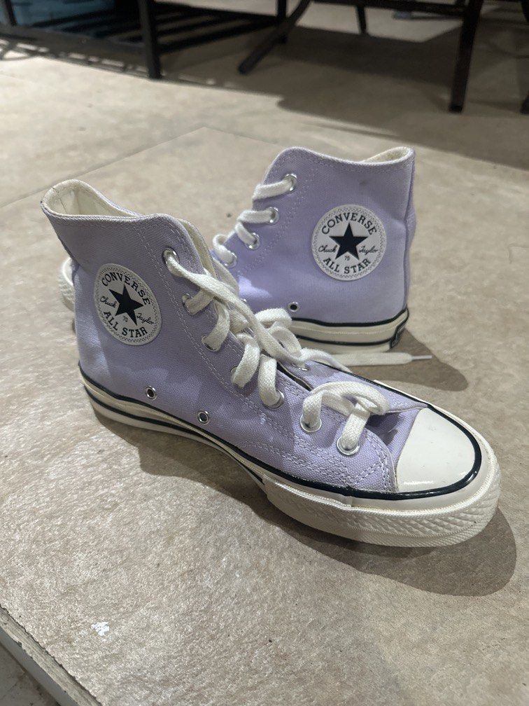 Converse Chuck 70 High in the Moonstone Violet (Category: Sneakers) located in Caloocan City. Submitted by hariel_beverly_onlineshop (Listing ID 1470654426, Image 2). Description: • Model: Converse Chuck 70 High • Colorway: Moonstone Violet / Lilac with Egret (off-white) rubber midsoles • Details: Heavyweight canvas upper, vintage glossy rubber foxing tape, cushioned OrthoLite insole, and the classic black-and-white Chuck Taylor ankle patch..