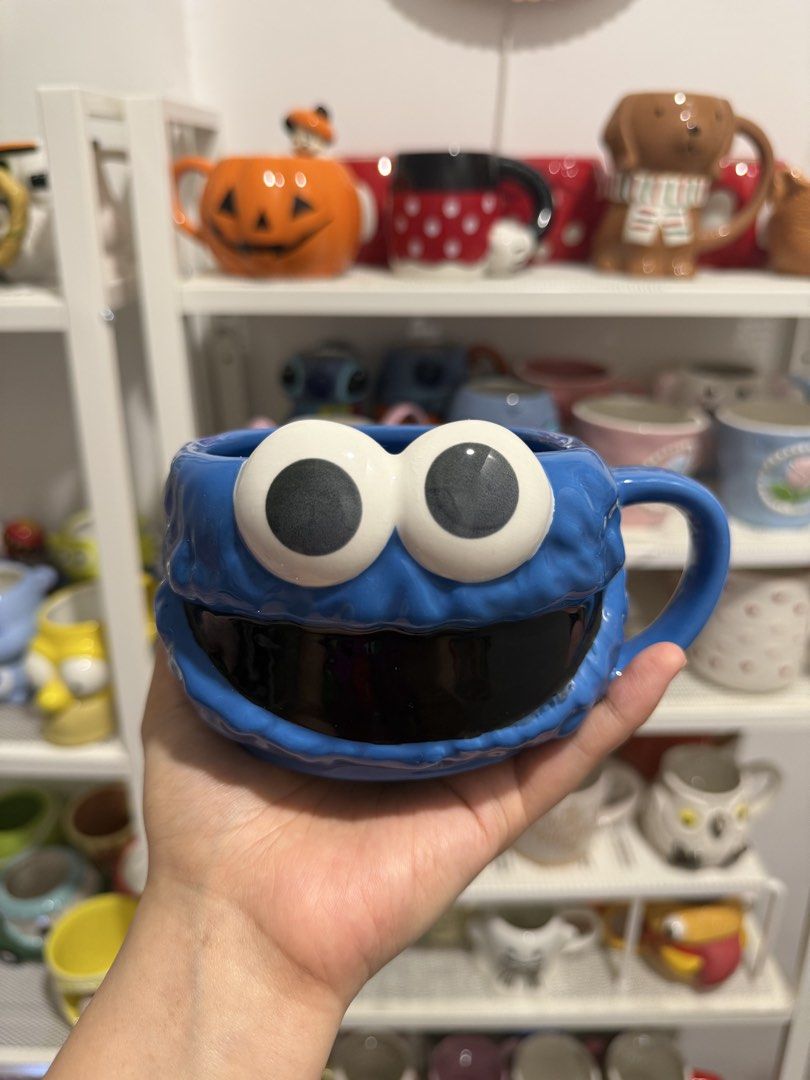 Cookie monster mug (Category: Coffee & Tea Tableware) located in Quezon City. Submitted by fragilebabies (Listing ID 1470562262, Image 1). Description: Please be reminded that these mugs are mall pull-out items. Minor imperfections such as small chips, slight paint chips, crazing (fine hairlines), and other minor marks may be present and are considered normal for mall pull-out items. That said, most of our mugs are still in good condition. Any no
