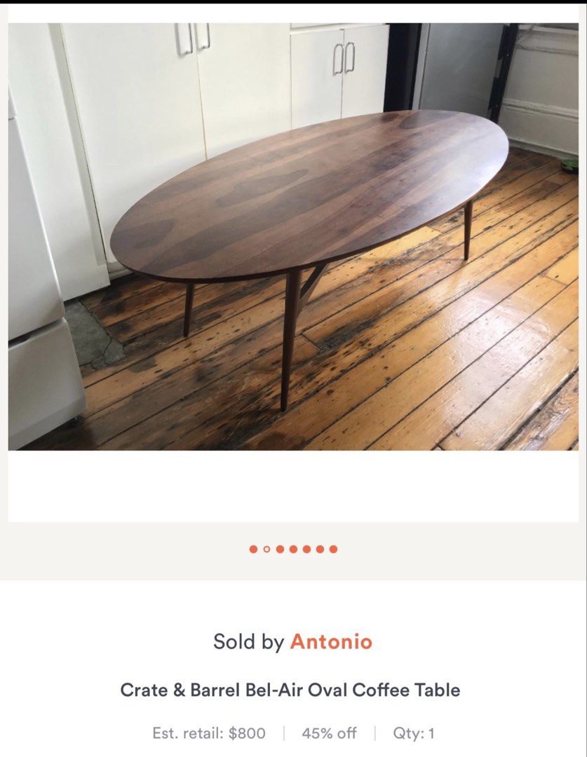 Crate & Barrel Bel-Air Oval Coffee Table (Category: Tables & Sets) located in Paranaque City. Submitted by richieboyriceboy (Listing ID 1470693125, Image 2). Description: - Material: Solid walnut with rich wood grain patterns - Design: Oval top with tapered mid-century style legs - Condition: Sturdy construction, fits great in front of sofas or sectionals - Reason for selling: Moving to new place - Free delivery within Makati BGC area.