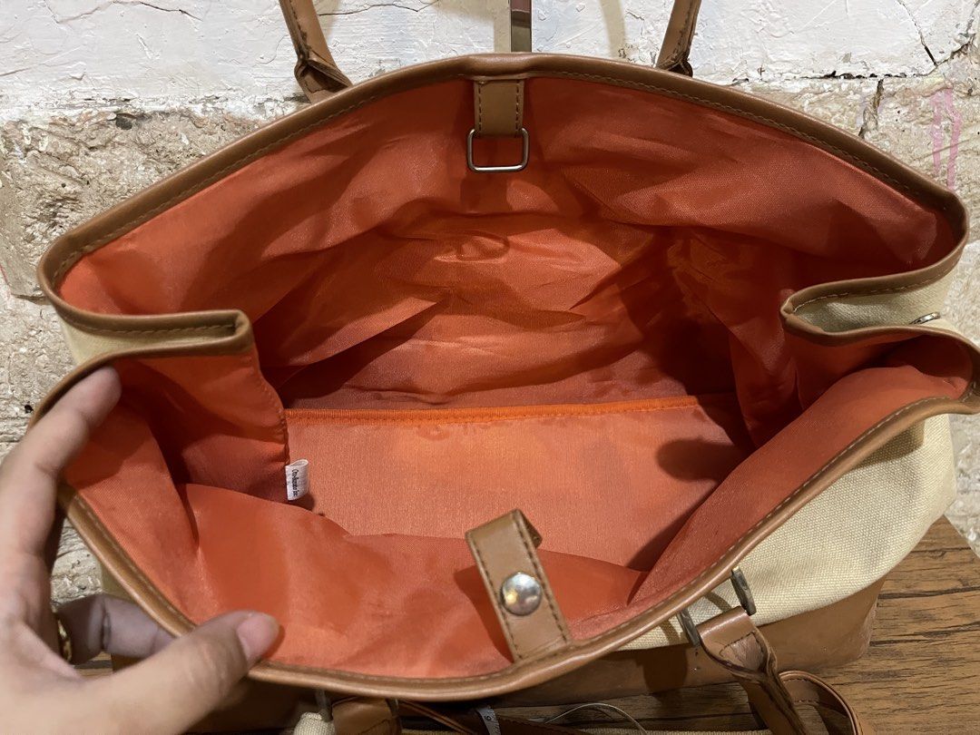 cream canvas and brown leather tote bag (Category: Tote Bags) located in San Fernando. Submitted by japansurpluselyu (Listing ID 1470645185, Image 3). Description: .
