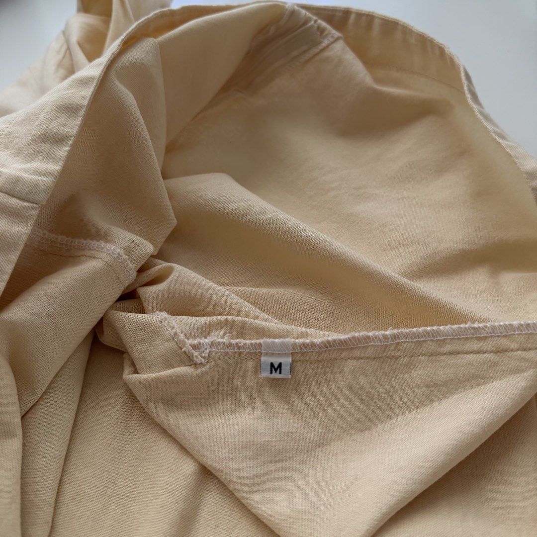 Cream Halter Top (Category: Sleeveless) located in Las Pinas. Submitted by frances.finds (Listing ID 1470625648, Image 3). Description: - LAST PRICE - bought for ₱500 last december 2025 - only washed once but never worn apart from trying it on - 4th photo not mine.