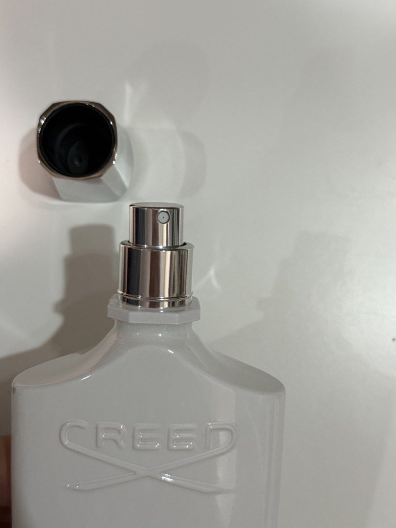 Creed Silver Mountain Water 100ml EDP (Category: Fragrance & Deodorants) located in Paranaque City. Submitted by nina_b14 (Listing ID 1470619281, Image 2). Description: - 100% Authentic Creed Silver Mountain Water - Size: 100ml / 3.3 fl oz - Signature white opaque flask with silver cap and embossed lettering - Batch Code: F003704 - Made in France by Ecomundo Paris - Well-kept and stored properly - Fast shipping and secure packaging guaranteed.