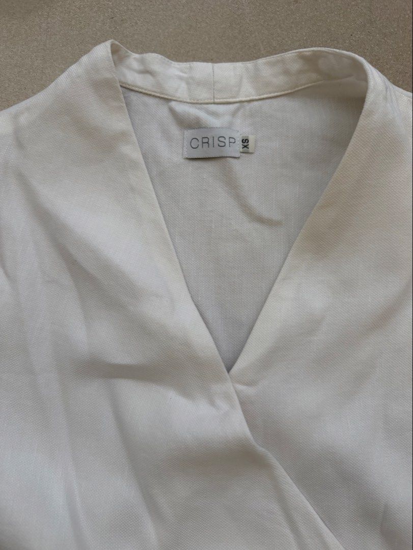 Crisp wrap around style top xs (Category: Blouses) located in Quezon City. Submitted by closet.cha (Listing ID 1470595917, Image 3). Description: *PLEASE READ DESCRIPTION, DO NOT MAKE AN OFFER IF YOU ARE NOT SURE* Size: Xs Good condition No return no exchange No haggle and low baller offers. No other photos or when worn for flat lays. No Meet-Ups No Cash on Delivery No Pera Padala at the moment. 🖊Please pay on time. No to joy reservers.🖊 *If no