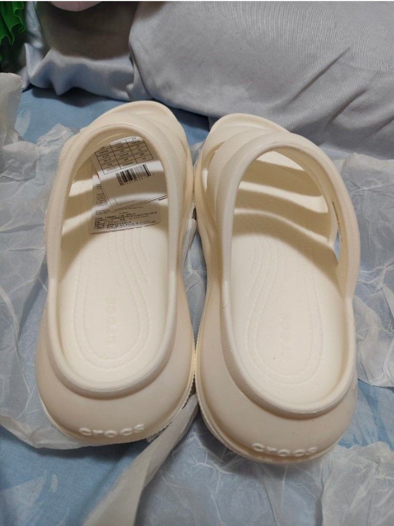 Crocs mega crush sandals (Category: Slippers and slides) located in Cainta. Submitted by buena_shoppe (Listing ID 1470678008, Image 2). Description: Cream Crocs Mega Crush triple strap sandals - Crocs logo on footbed and sole - Size clearly indicated on the sole - Comes with the original tag brand new with tag sz 6 , best fits sz 7 shoe size 💯 original mall price at 4,999 pm for details.