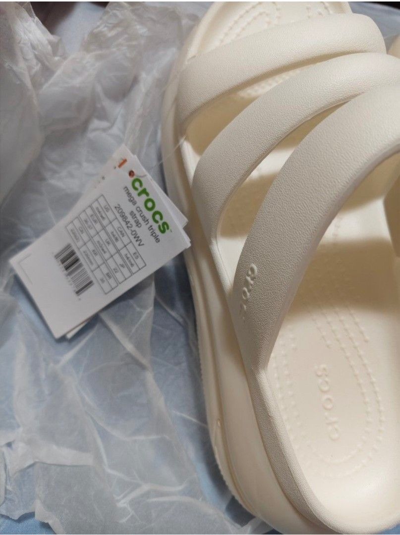 Crocs mega crush sandals (Category: Slippers and slides) located in Cainta. Submitted by buena_shoppe (Listing ID 1470678008, Image 3). Description: Cream Crocs Mega Crush triple strap sandals - Crocs logo on footbed and sole - Size clearly indicated on the sole - Comes with the original tag brand new with tag sz 6 , best fits sz 7 shoe size 💯 original mall price at 4,999 pm for details.