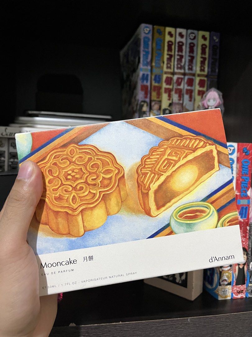 d'Annam Mooncake Eau de Parfum 50ml (Category: Fragrance & Deodorants) located in Manila. Submitted by hankim24 (Listing ID 1470649726, Image 1). Description: - Brand: d'Annam - Fragrance: Mooncake Eau de Parfum - Size: 50ml / 1.7 fluid ounces - Type: Natural spray vaporisateur - Packaging: Clean white outer box featuring colorful illustrated mooncakes - Condition: Brand new and authentic - Perfect for perfume collectors and unique scent lovers.