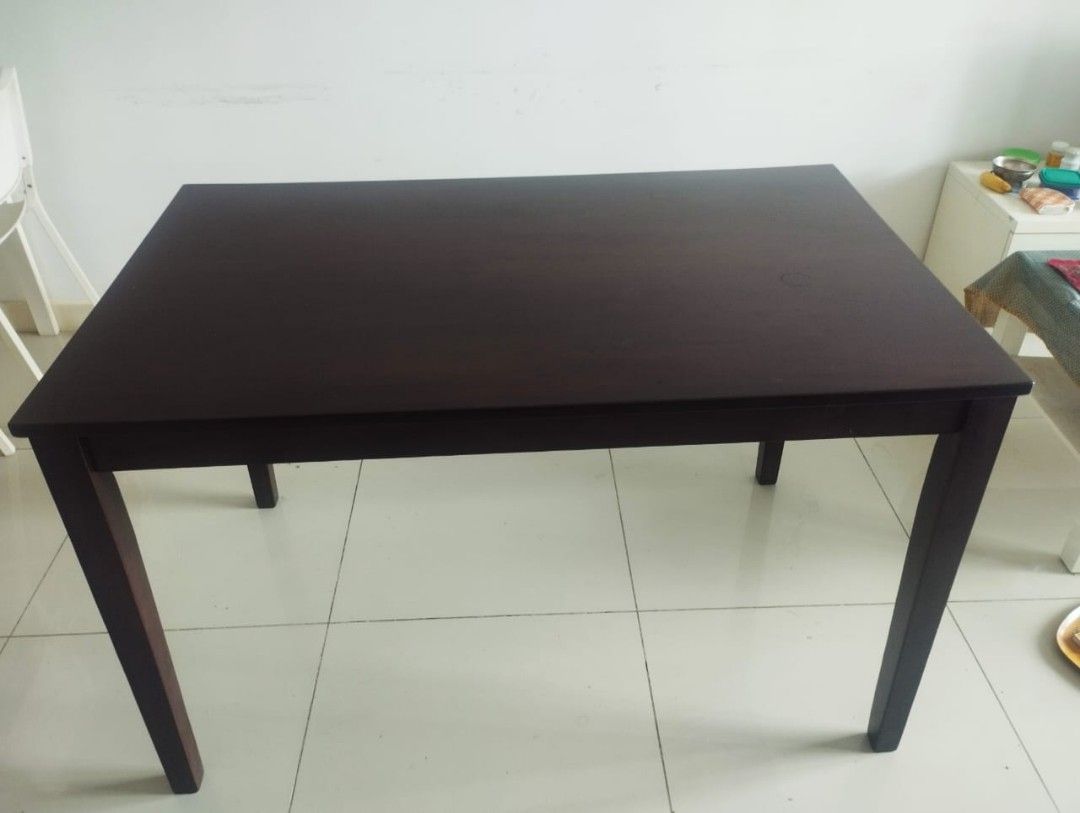 IKEA Nasinge Table (Category: Tables & Sets) located in Kuala Lumpur. Submitted by raghav247 (Listing ID 1470701613, Image 2). Description: IKEA Nasinge Table Condition: Very good (9.5/10) Original Purchase price: RM 599 Asking Price: RM 200 - Material: Solid dark brown wood with a sturdy build & with strong legs.