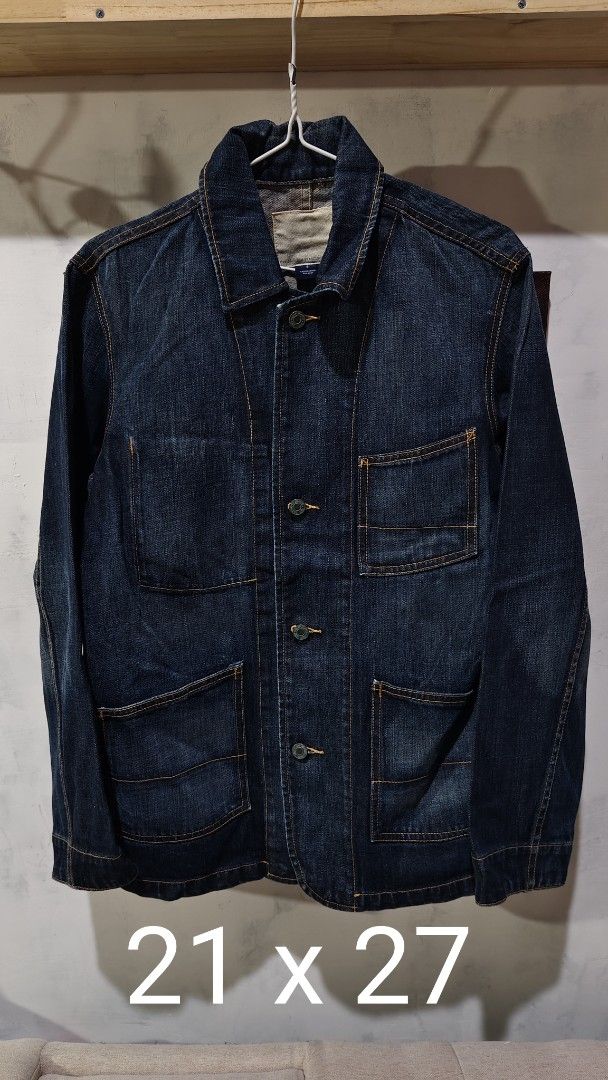 Dark Denim Chore Jacket Workwear Coat (Category: Coats, Jackets and Outerwear) located in Quezon City. Submitted by truedeer_cda94c (Listing ID 1470608613, Image 1). Description: - Dark wash denim chore jacket with striking contrast stitching - Features four front utility pockets for practicality - Classic button-up front with a structured collar and straight hem - Measurements: 21" across chest x 27" in length - Perfect layering piece to keep yo