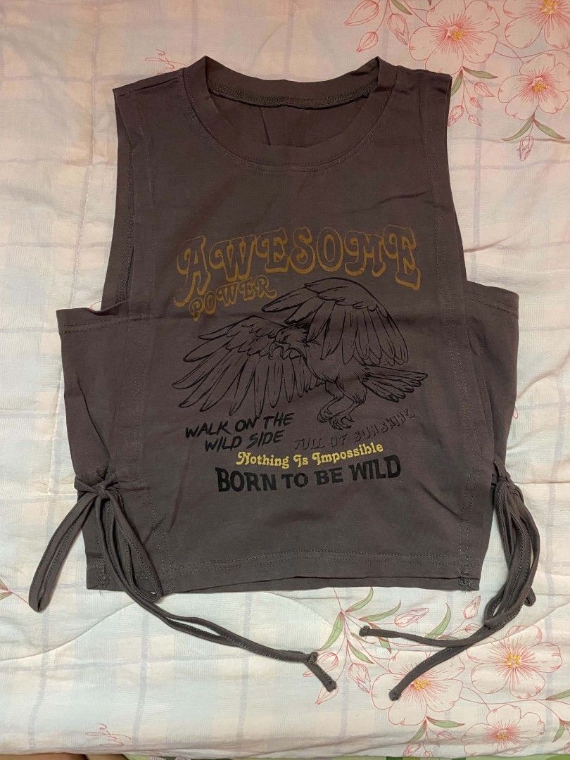 Dark Grey Graphic Tank Top with Side Ties (Category: Sleeveless) located in Bay. Submitted by doreendavasol2 (Listing ID 1470739974, Image 1). Description: Medium .