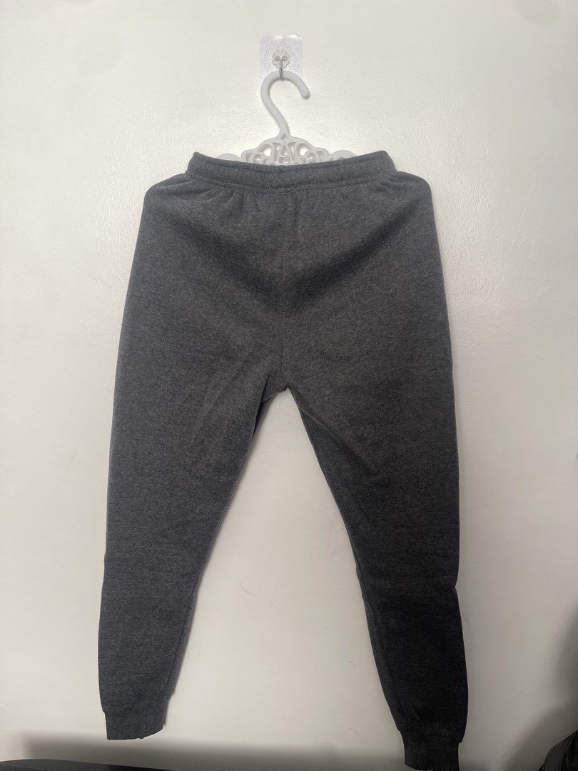 Dark Grey Jogger Sweatpants with Zipper Pockets (Category: Other Bottoms) located in Manila. Submitted by lovedbymidge (Listing ID 1470637502, Image 2). Description: 🩷 for m-l girlies (worn twice, in good condition) 🚚 lalamove or grab express (sf shouldered by the buyer!) - Color: Dark grey - Material: Soft cotton blend - Waistband: Elastic with adjustable black drawstring - Pockets: Secure zippered side pockets for phone and keys - Cuffs: Ribb