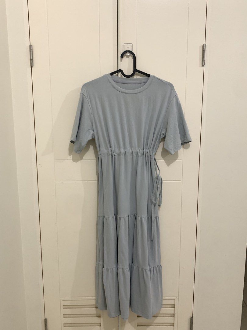 Dazy Light Blue Tiered Midi Dress (Category: Dresses) located in Pasig City. Submitted by lovedbyri (Listing ID 1470647987, Image 1). Description: - Brand/Style: Dazy light blue midi dress - Material: Super comfortable cotton - Fit & Details: Short sleeves, round neckline, and gathered waist with adjustable side drawstrings - Design: Flowy tiered skirt, hits around mid-calf - Styling: Perfect for everyday casual wear, easy to pair with sandals or