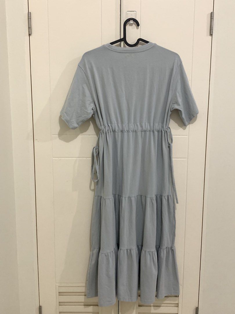 Dazy Light Blue Tiered Midi Dress (Category: Dresses) located in Pasig City. Submitted by lovedbyri (Listing ID 1470647987, Image 2). Description: - Brand/Style: Dazy light blue midi dress - Material: Super comfortable cotton - Fit & Details: Short sleeves, round neckline, and gathered waist with adjustable side drawstrings - Design: Flowy tiered skirt, hits around mid-calf - Styling: Perfect for everyday casual wear, easy to pair with sandals or