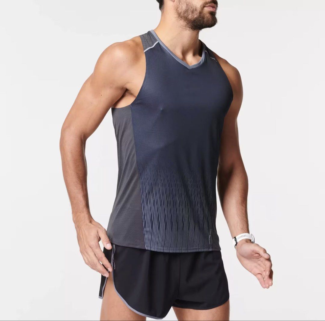 Decathlon Kiprun Chafree-Light Running Tank Top (Category: Activewear) located in Davao. Submitted by eyedea300064714 (Listing ID 1470638944, Image 1). Description: - Brand/Model: Decathlon Kiprun Men's Running Singlet - Color: Dark grey and blue tones - Fabric: Lightweight mesh with anti-chafing construction for maximum comfort - Safety: Reflective details on shoulders and back spine for night runs - Design: V-neck cut, sleeveless, standard men'