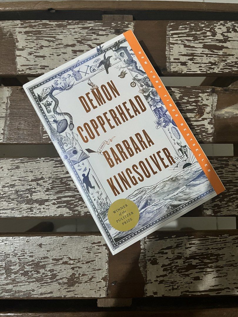 Demon Copperhead by Barbara Kingsolver Paperback Novel (Category: Storybooks) located in Manila. Submitted by albrechtt (Listing ID 1470667928, Image 1). Description: - Title: Demon Copperhead by Barbara Kingsolver - Condition: Brand new, still sealed in original plastic shrink wrap (never opened/read) - Accolades: Pulitzer Prize Winner & New York Times Bestseller - Edition: Harper Perennial - ISBN: 978-0-06-325198-4.