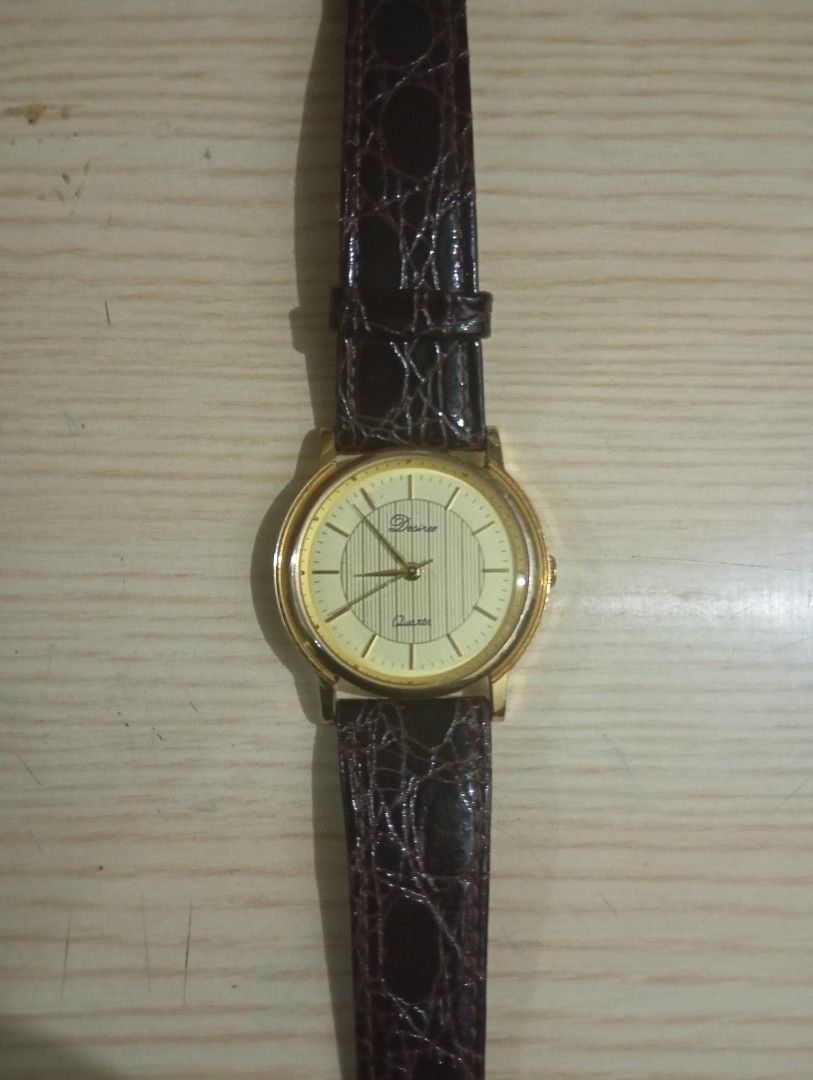 Desiree parture japan (Category: Women's Watches) located in Las Pinas. Submitted by quick_deals_great_finds2 (Listing ID 1470679268, Image 2). Description: Original good working condition Quartz with battery 32mm medium unisex.
