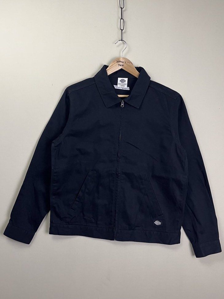 Dickies Black Work Jacket (Category: Coats, Jackets and Outerwear) located in Malaybalay. Submitted by toffee_s_thrift0.1 (Listing ID 1470520312, Image 2). Description: - Brand: Dickies - Color: Black - Size: Large (Width: 23" | Length: 27") - Style: Classic collared full-zip work jacket with front angled pockets - Details: Williamson-Dickie neck label, adjustable button tabs at back hem - Condition: Clean dark fabric with solid, durable stitchin