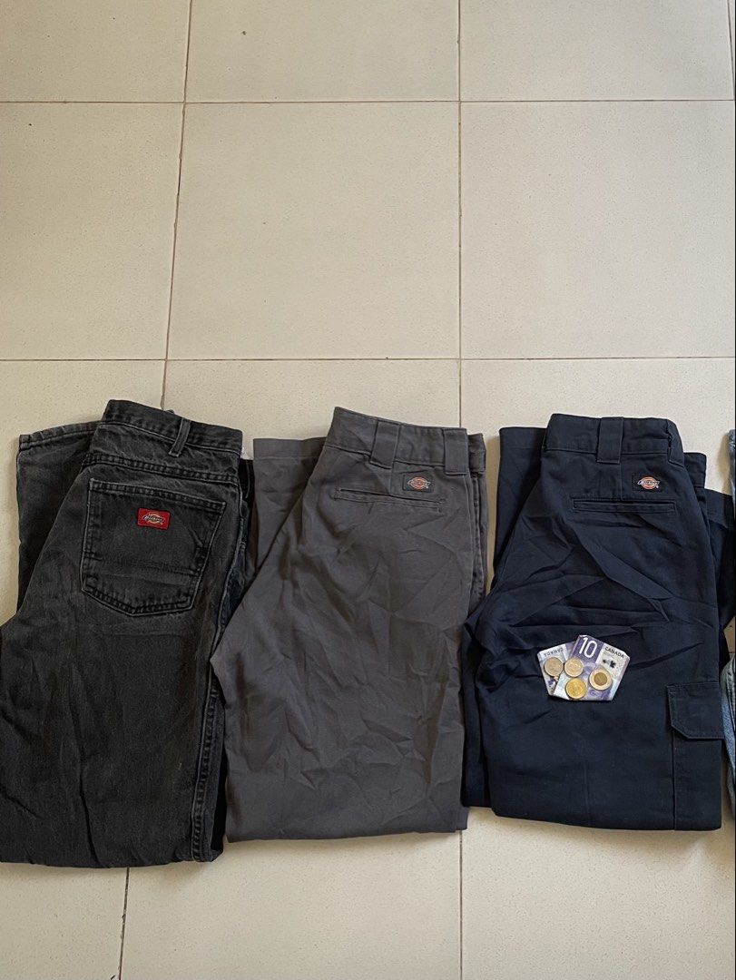 Dickies Work Pants and Jeans Bundle (Category: Jeans) located in Caloocan City. Submitted by bk_intal (Listing ID 1470626461, Image 1). Description: - Brand: Dickies - Quantity: Bundle of 3 pairs - Items included: Black denim jeans, grey work pants, and dark navy cargo pants - Material: Sturdy cotton fabric, ideal for daily wear or work - Details: Features classic brand tags on the back pockets - Reason for selling: Closet clear-out, grab all thr