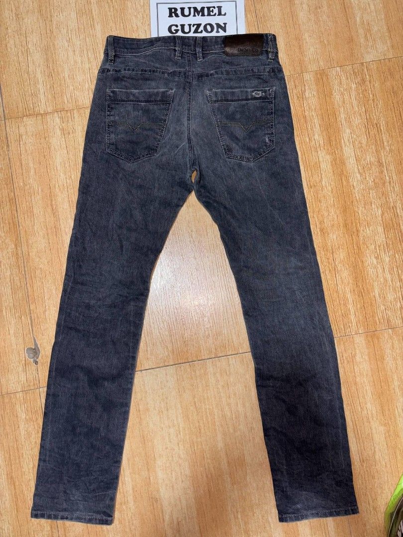 Diesel Regular Slim Jeans Grey Size 29 L32 (Category: Jeans) located in Quezon City. Submitted by rumel.guzon1630-15361 (Listing ID 1470736482, Image 2). Description: - Brand/Model: Diesel Brad wash 0806Z stretch denim jeans - Color: Dark grey wash - Tagged Size: W29 L32 - Measurements: ~17 inches across the waist, ~42 inches total length - Details: Button fly closure, Diesel-Co leather back patch, branded rivets, and classic back pocket stitchin