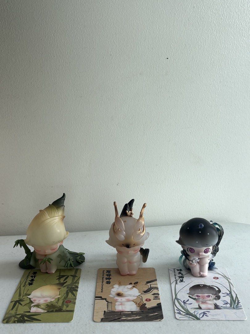 DIMOO Stories in the Cup Series (Category: Designer & Blind Box Toys) located in Manila. Submitted by be14za33 (Listing ID 1470629599, Image 1). Description: FOR SALE Ink Bamboo Painting Rooftop Guardian Creatures Exhale Like an Orchid - No foil or box included - All complete and in good condition - PM for more pictures or inquiries 📍Location: Quezon City MOP: GCASH / Bank Transfer MOD: JNT / LBC .