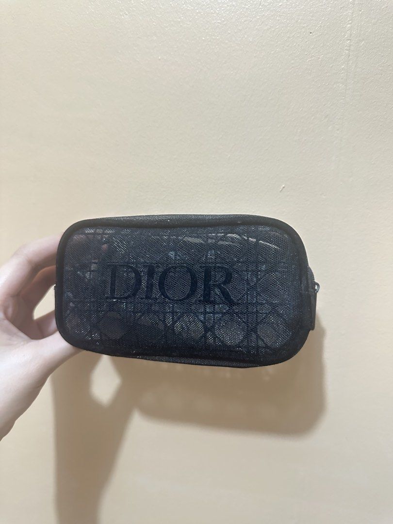 Dior Black Pouch (Category: Purses & Pouches) located in Rizal. Submitted by miss2lyps (Listing ID 1470587877, Image 1). Description: - like new, no issue.