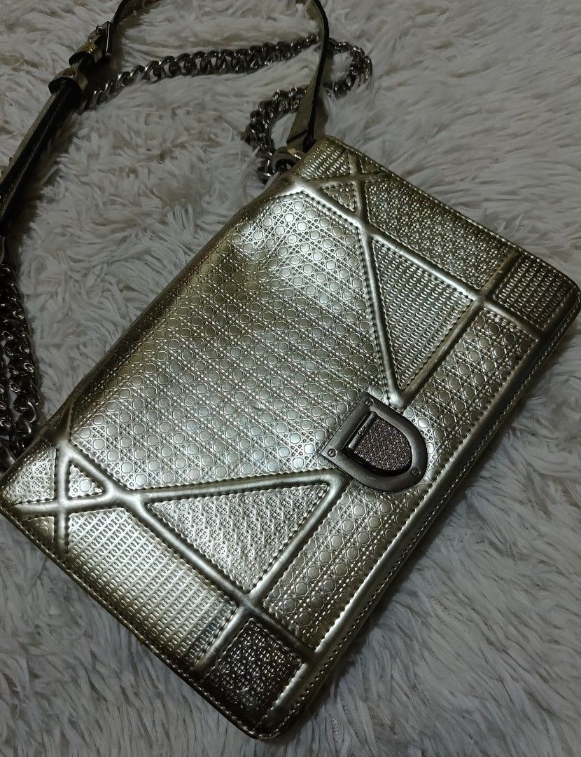 Dior Metallic Gold Diorama Flap Bag (Category: Luxury Bags & Wallets) located in Quezon City. Submitted by lootsniwoah_12 (Listing ID 1470631093, Image 2). Description: - Authentic Dior Diorama bag in striking gold metallic leather - Features modern geometric cannage quilting and silver-tone hardware - Signature 'Dior' clasp front lock closure - Structured accordion side gussets with matching pattern - Includes a comfortable chain-link and leathe