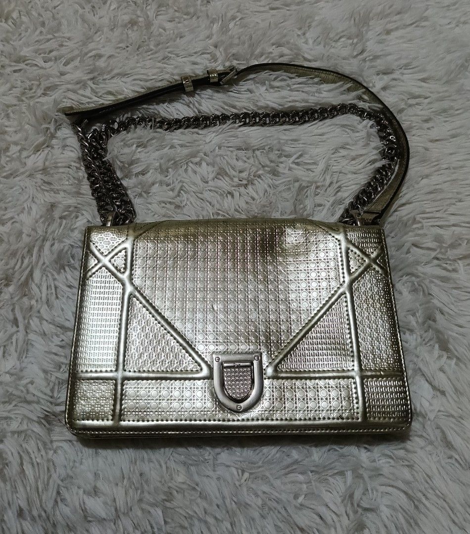 Dior Metallic Gold Diorama Flap Bag (Category: Luxury Bags & Wallets) located in Quezon City. Submitted by lootsniwoah_12 (Listing ID 1470631093, Image 1). Description: - Authentic Dior Diorama bag in striking gold metallic leather - Features modern geometric cannage quilting and silver-tone hardware - Signature 'Dior' clasp front lock closure - Structured accordion side gussets with matching pattern - Includes a comfortable chain-link and leathe