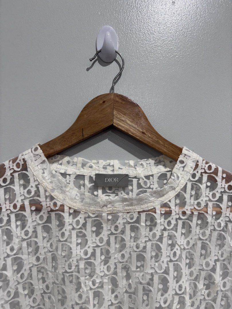 Dior White Oblique Viscose Transparent Shirt (Category: Luxury Apparel) located in Dumaguete. Submitted by dgte.grails (Listing ID 1470656582, Image 2). Description: Dior White Oblique Viscose Transparent Shirt 22 width 28 length Excellent condition See last picture for the flaws 1500+sf pm.