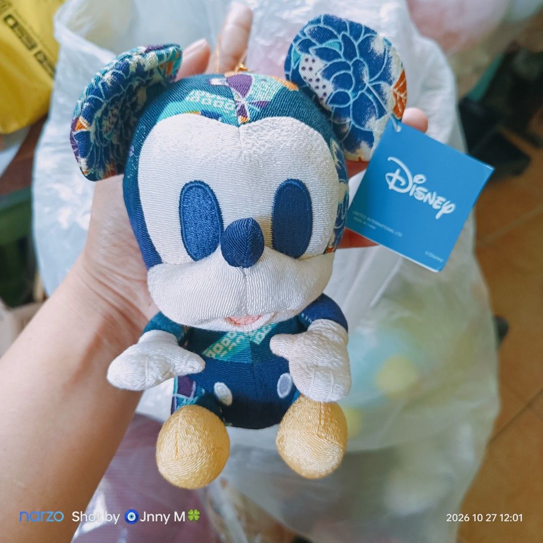 Disney Mickey Mouse Japanese Pattern Plush Keychain (Category: Plushies & Soft Toys) located in Taguig. Submitted by mhayestufftoys (Listing ID 1470641819, Image 1). Description: - Authentic Disney Mickey Mouse plush keychain - Features unique traditional Japanese fabric patterns in blue and multi-color - Textured material on the body, ears, and iconic yellow shoes - Includes original blue Disney tag hanging from the ear - Compact size, perfect f
