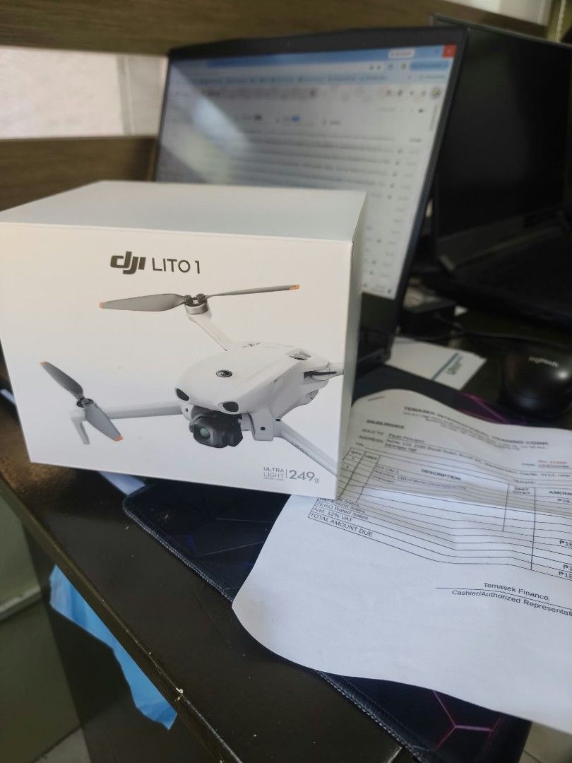 DJI Lito 1 Drone (Category: Drones) located in Manila. Submitted by meowmeow937 (Listing ID 1470567654, Image 2). Description: - Item: DJI Lito 1 Drone (White) - Condition: Brand new, factory-sealed with original green tab intact - Weight: 249g ultra-light build (hassle-free flying) - Inclusions: Drone, flight battery, remote controller, RC cables, screwdriver, spare propellers, and manuals - Warranty/Proof of Purchase: Includes official invoice 