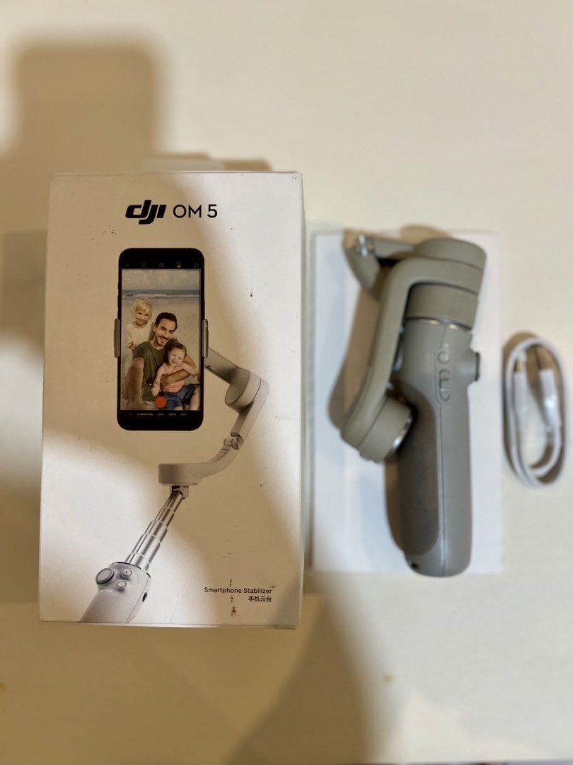 DJI OM 5 Smartphone Stabilizer (Category: Video Cameras) located in Bacoor. Submitted by mariiiaph (Listing ID 1470645768, Image 1). Description: Complete with box Fixed Price .