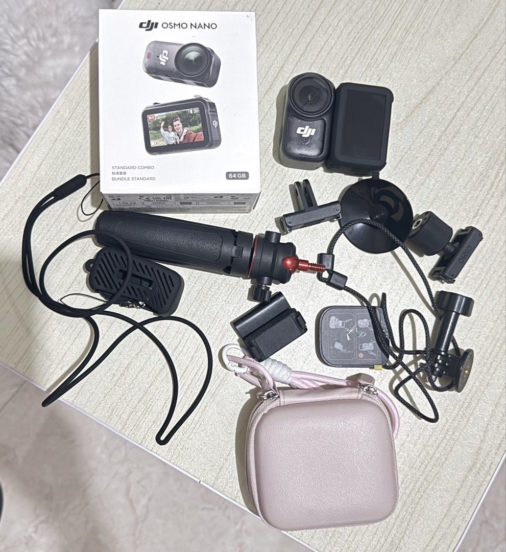 DJI Osmo Nano Standard Combo 64GB with Accessories (Category: Cameras) located in Manila. Submitted by kweenlee (Listing ID 1470656665, Image 1). Description: - Model: DJI Osmo Nano 64GB Standard Combo - Condition: Clean, 100% complete with all original parts - Inclusions: Original box, camera unit, touchscreen module, mini tripod handle, protective case, mounts, and neck lanyard - Ideal for: Vlogging, travel, and content creation - Ready to use: