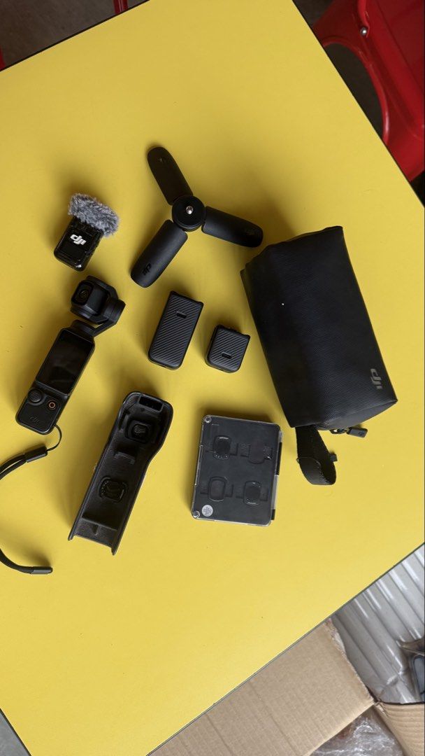 DJI Pocket 3 Creator Combo Camera with Mic and Accessories (Category: Cameras) located in Bacolod City. Submitted by angeliqueyusay (Listing ID 1470628095, Image 2). Description: - DJI Pocket 3Creator Combo (Complete set) - Includes handheld gimbal camera, mini tripod, and wireless mic with deadcat - Comes with wide-angle lens, extra handle bases, filter case, and carrying pouch - Everything packs neatly into the original case - Ultimate portable