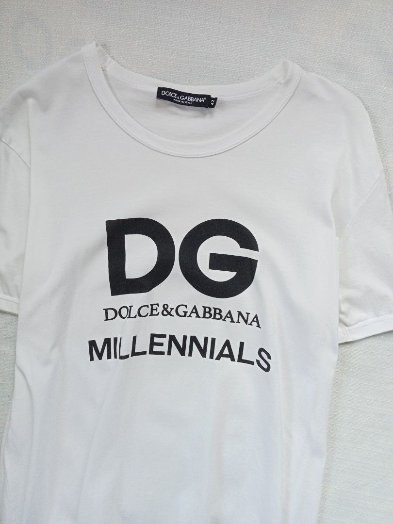 Dolce and Gabbana millennials DG white roundneck tee (Category: Luxury Apparel) located in Bagabag. Submitted by thrift_stories96 (Listing ID 1470697035, Image 2). Description: Dolce and Gabbana millennials DG white roundneck tee Size 42 - Unisex Medium to Large womens Medium mens Length - 27.5 Width - 20 Condition - excellent No flaw.