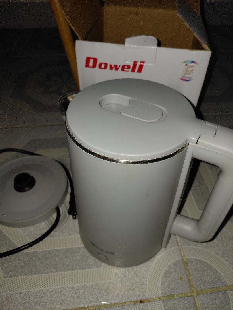 Dowell Electric Kettle EK-817 1.8L (Category: Kettles & Airpots) located in Manila. Submitted by raestheticsells (Listing ID 1470701986, Image 1). Description: - Brand/Model: Dowell Electric Kettle EK-817 - Color: Light Grey - Condition: Used, fully functional, with some mineral buildup and stains on the interior heating plate (check photos, bought just last march 2026) - Inclusions: Comes with the original power base and original box with retail