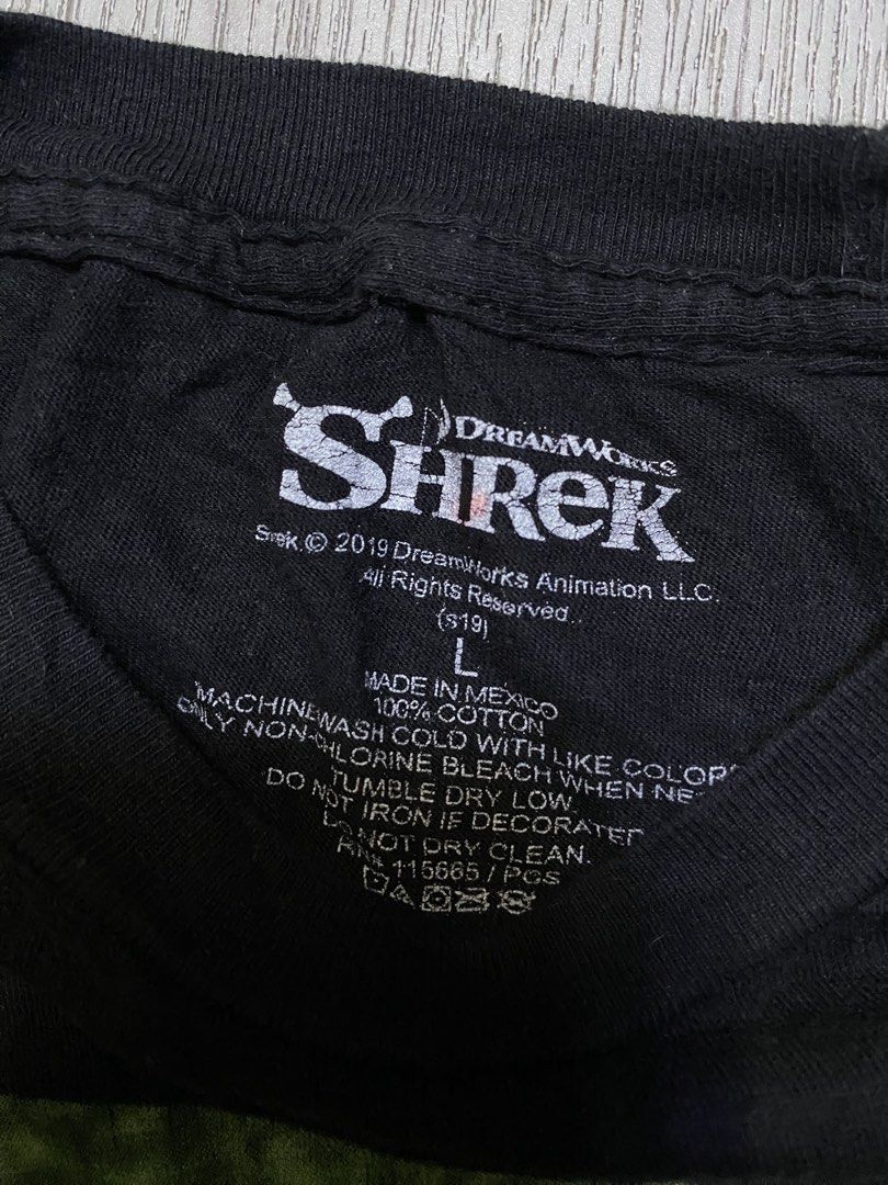 DreamWorks Shrek Graphic Tee (Category: Tshirts & Polo Shirts ) located in Pasig City. Submitted by terrencec34805 (Listing ID 1470719068, Image 3). Description: Official DreamWorks Shrek graphic tee Excellent condition Size:Large Width:21 Length:28 .