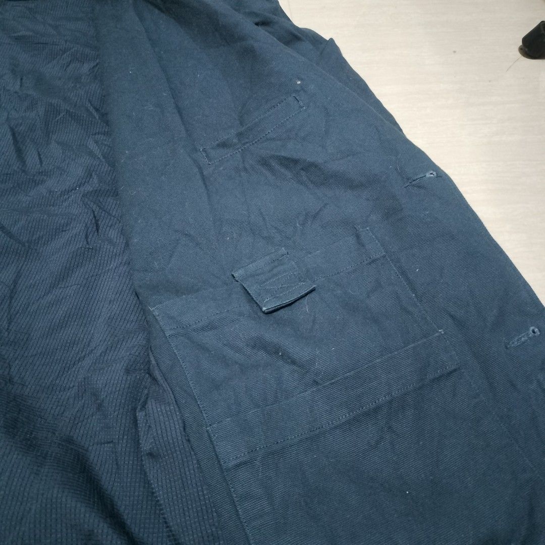 DULUTH TRADING CHORE COAT JACKET (Category: Coats, Jackets and Outerwear) located in Sariaya. Submitted by social_animalz (Listing ID 1470694437, Image 3). Description: 26 x 32.5 navy blue color 3 pocket sa labas, multiple pocket sa loob heavy fabric parang sa carhartt missing 1 button shipping fee is not included.