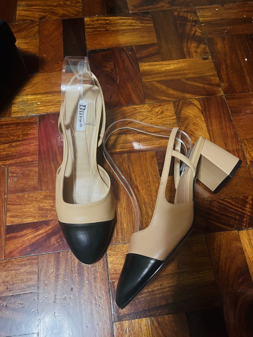 Dune London Sling Back Toe Cap Heels (Category: Heels) located in Manila. Submitted by maimaimai.store (Listing ID 1470674267, Image 2). Description: - Brand: Dune London (Model: 510Crofts) - Style: Slingback heels with chunky block heel and classic black toe cap - Color: Camel leather with black - Size: UK 4 / EU 37 - Condition: Brand new, never worn, pristine soles - Inclusions: Original box with store price tag (₱5,950).