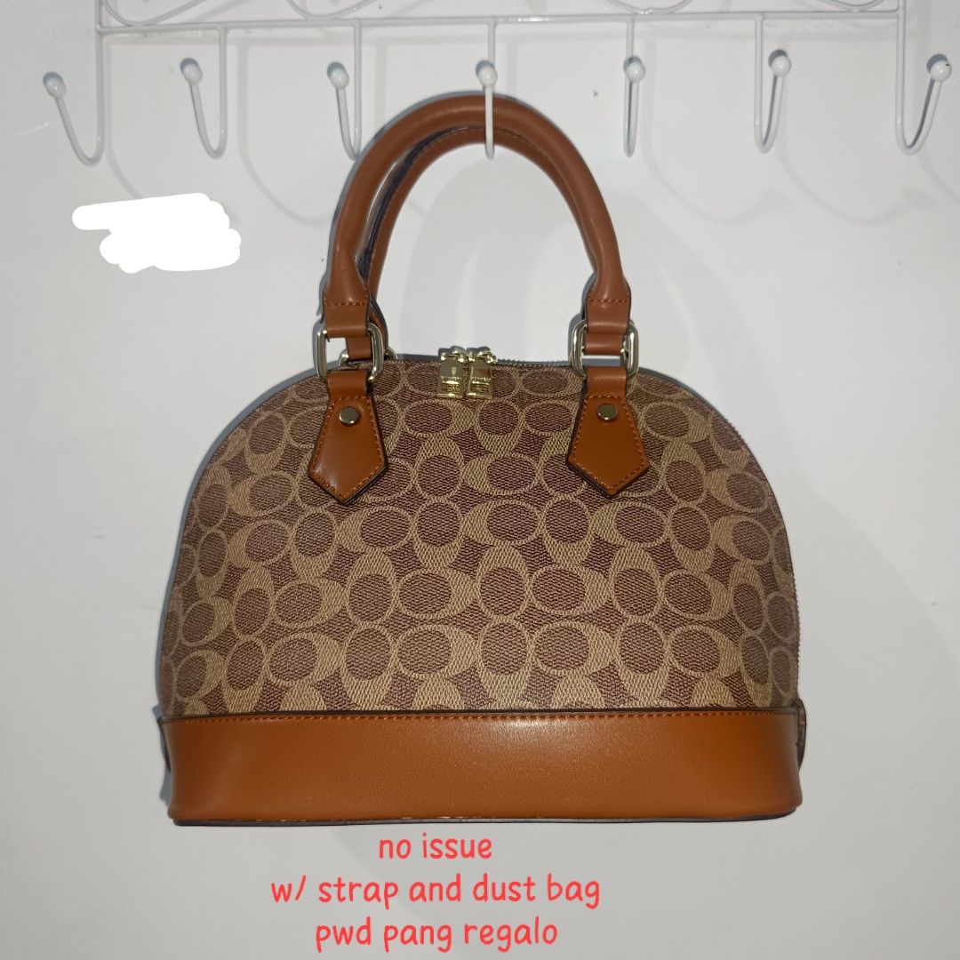 Durlapue Black Shoulder Bag (Category: Shoulder Bags) located in Manila. Submitted by fiercefalcon.ce51d1 (Listing ID 1470738395, Image 1). Description: for take all with freebies sa sure buyer - Brand: Durlapue - Color: Black fabric with pink accents - Condition: Used only once, super clean inside and out - Design: Twin shoulder straps, zip top closure - Details: Pink front brand patch and matching pink zip pullers - Storage: Roomy interior for 