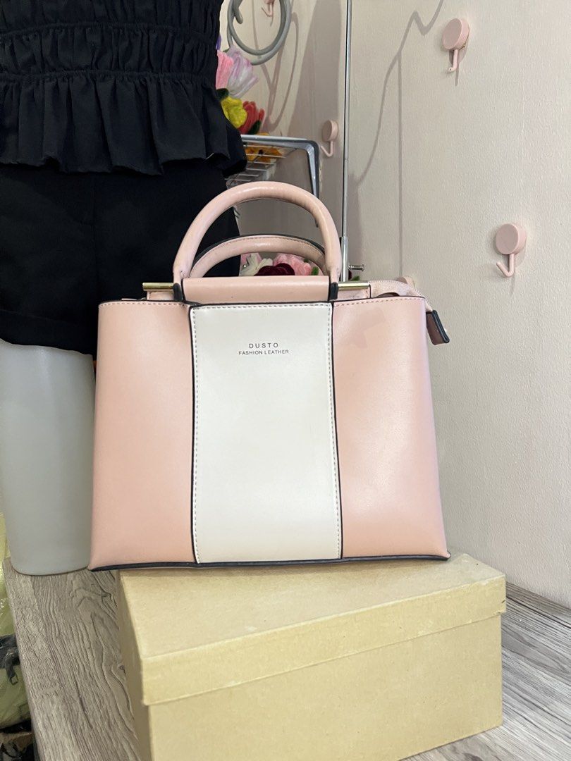 DUSTO Top Handle with sling (Category: Cross-body Bags) located in Quezon City. Submitted by handpicked_collections_ph (Listing ID 1470688572, Image 1). Description: .